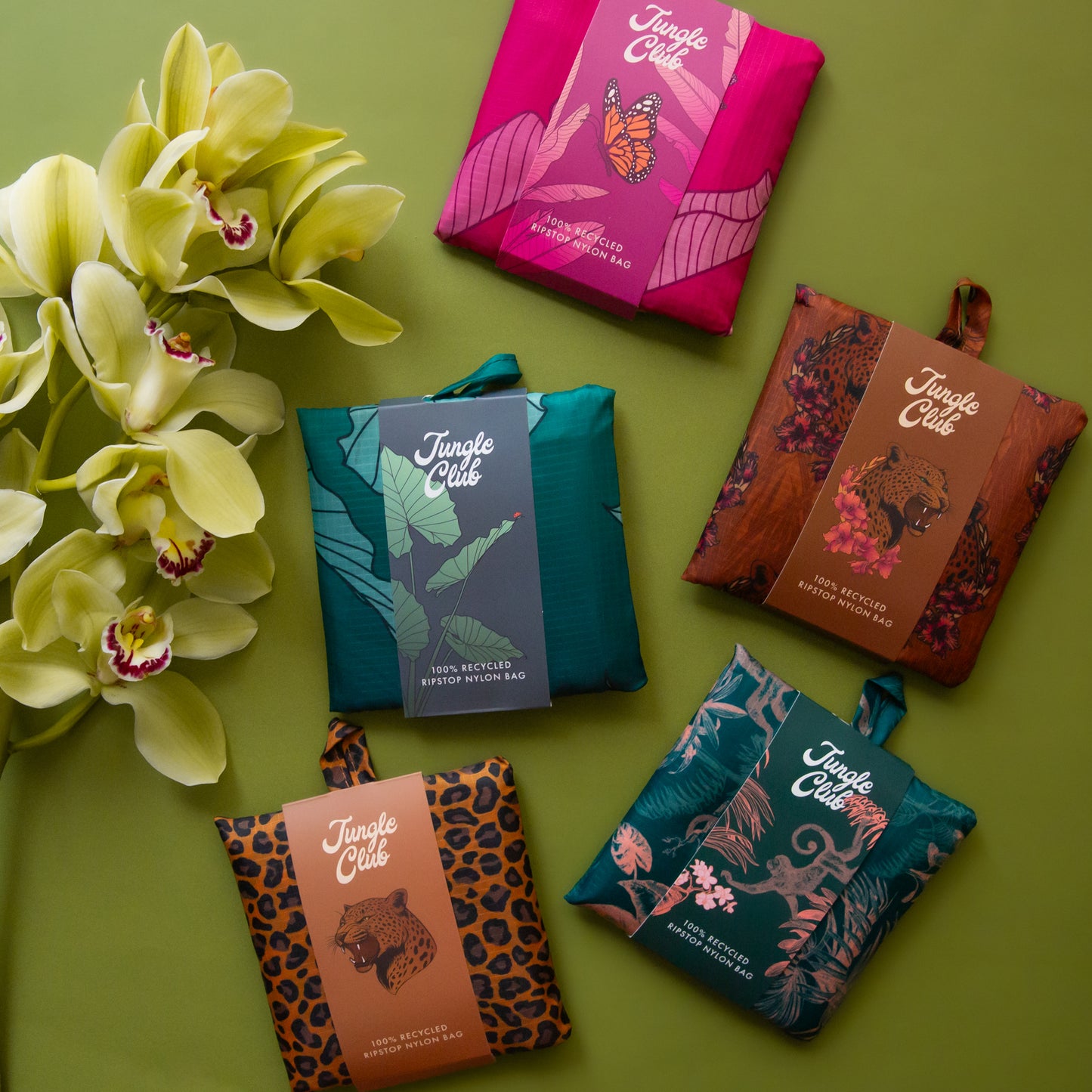 All the reusable bags folded in their pouches next to one another.