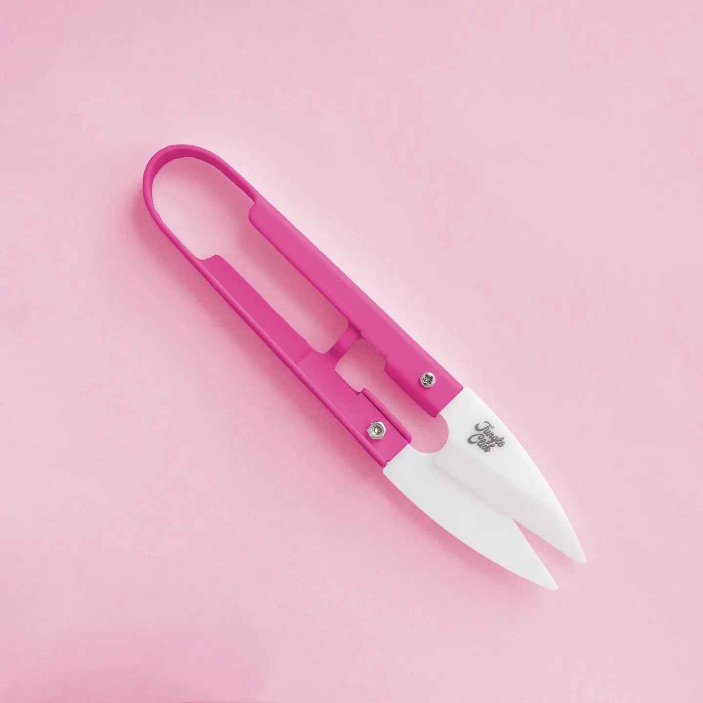 Mini bright pink planting shears are shown against a light pink background. 