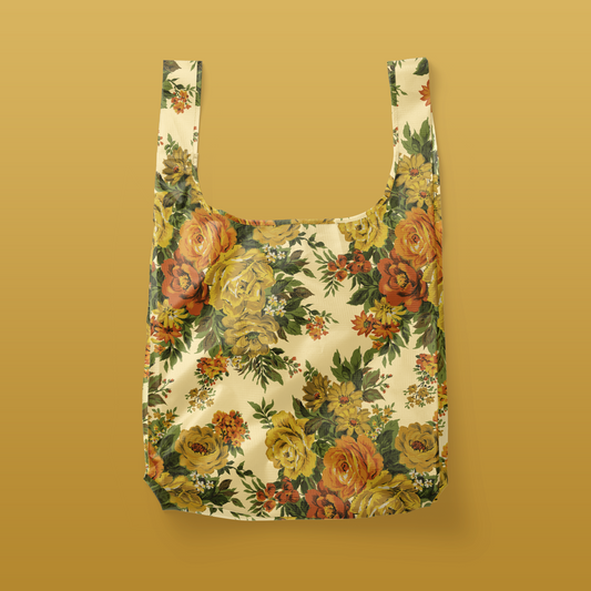 A yellow and orange floral nylon tote bag. 