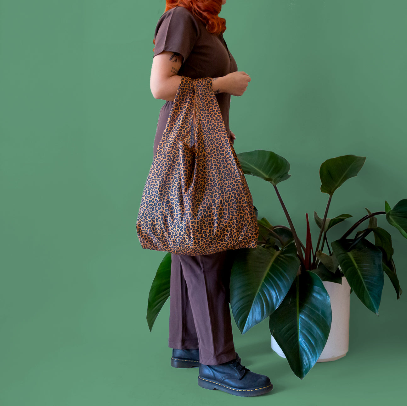 A brown and black leopard print reusable bag. 