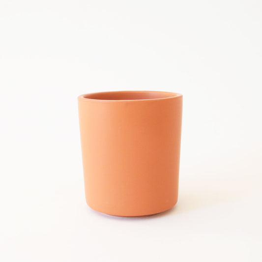 A terracotta ceramic vase perfect for succulents, cacti or just a small plant.